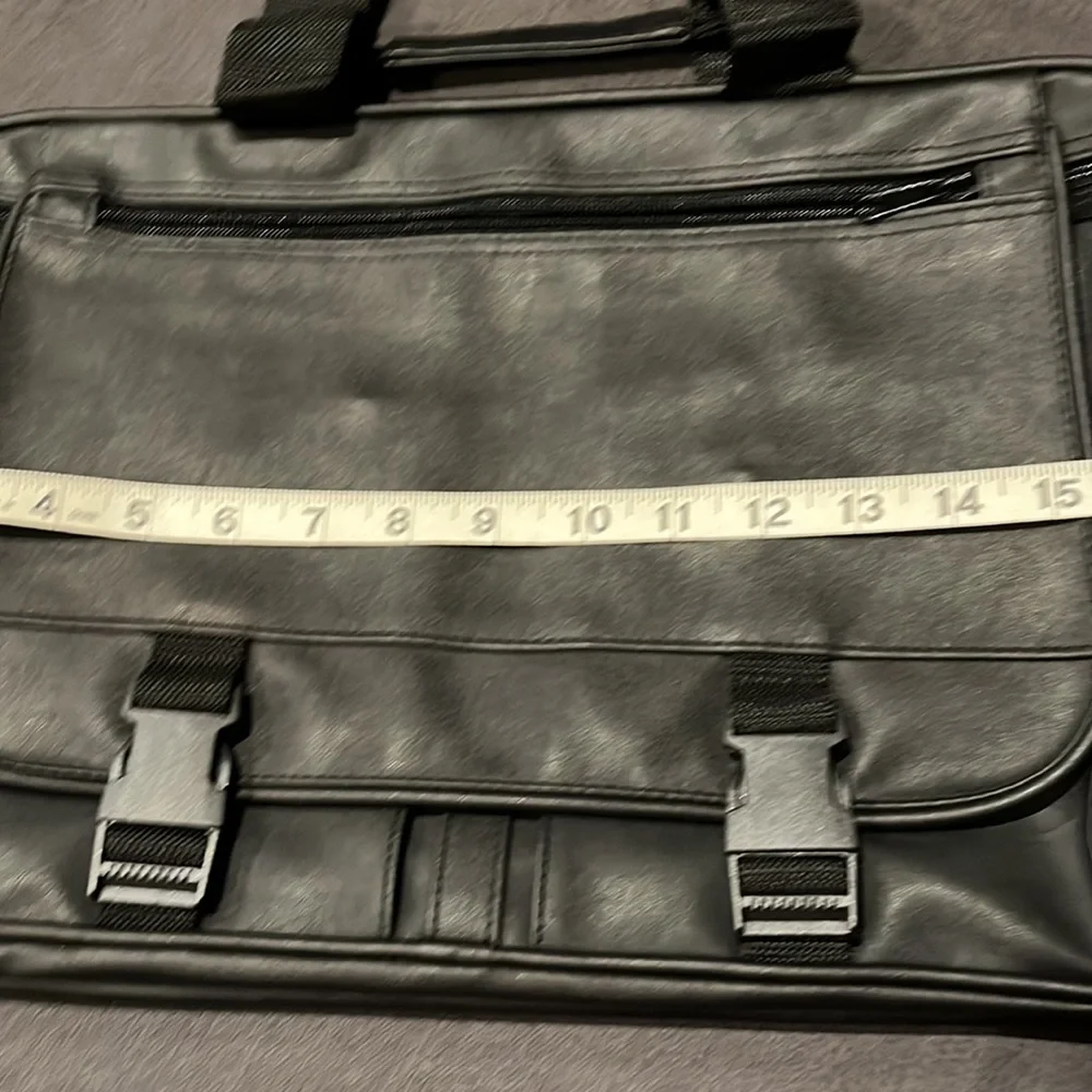 Briefcase, Black, Handles and Shoulder Straps lots of storage.
